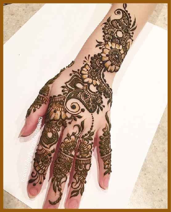 Stylish Back Hand Bridal Mehndi With Thick Trails
